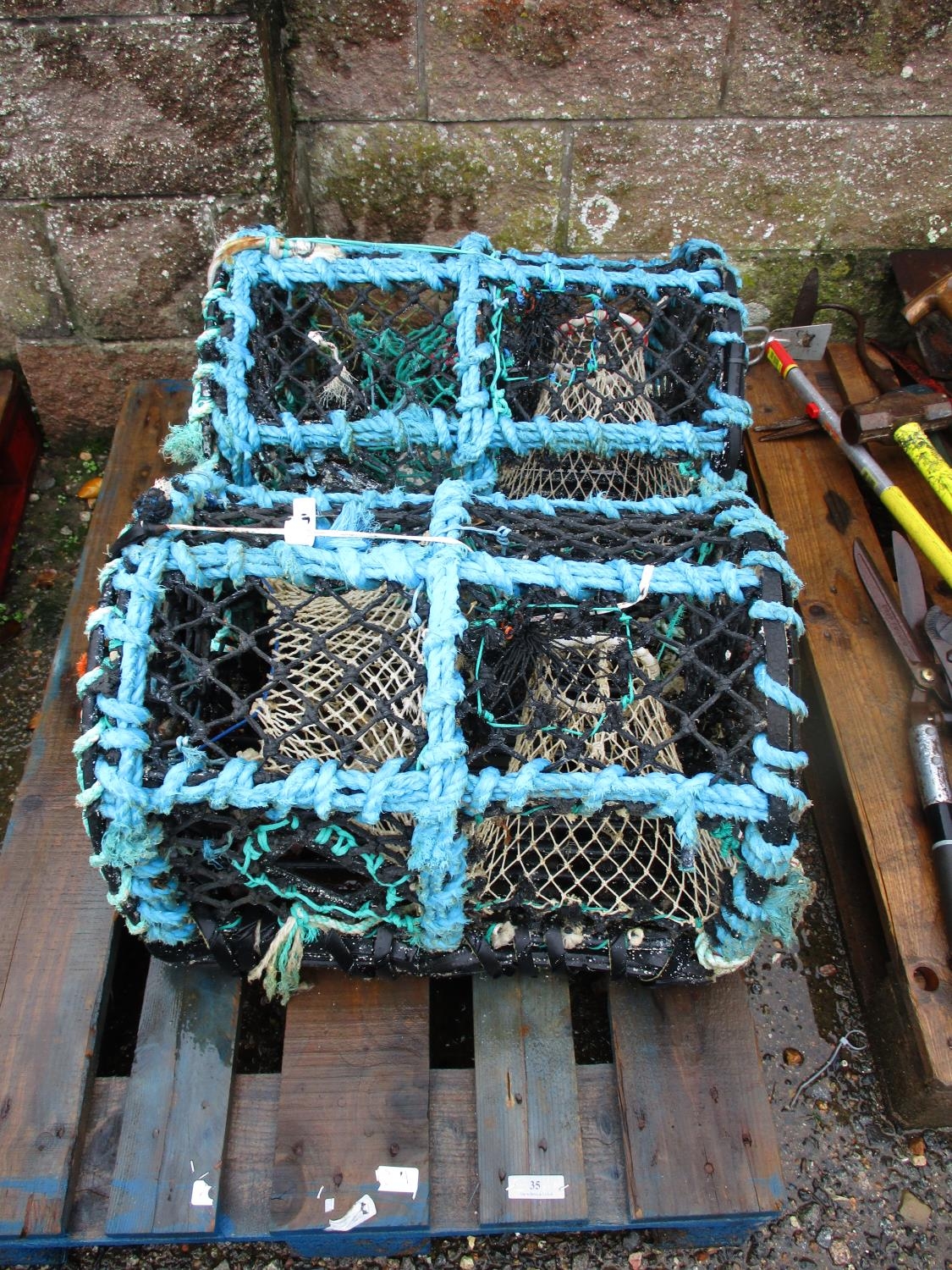 Two parlour lobster pots