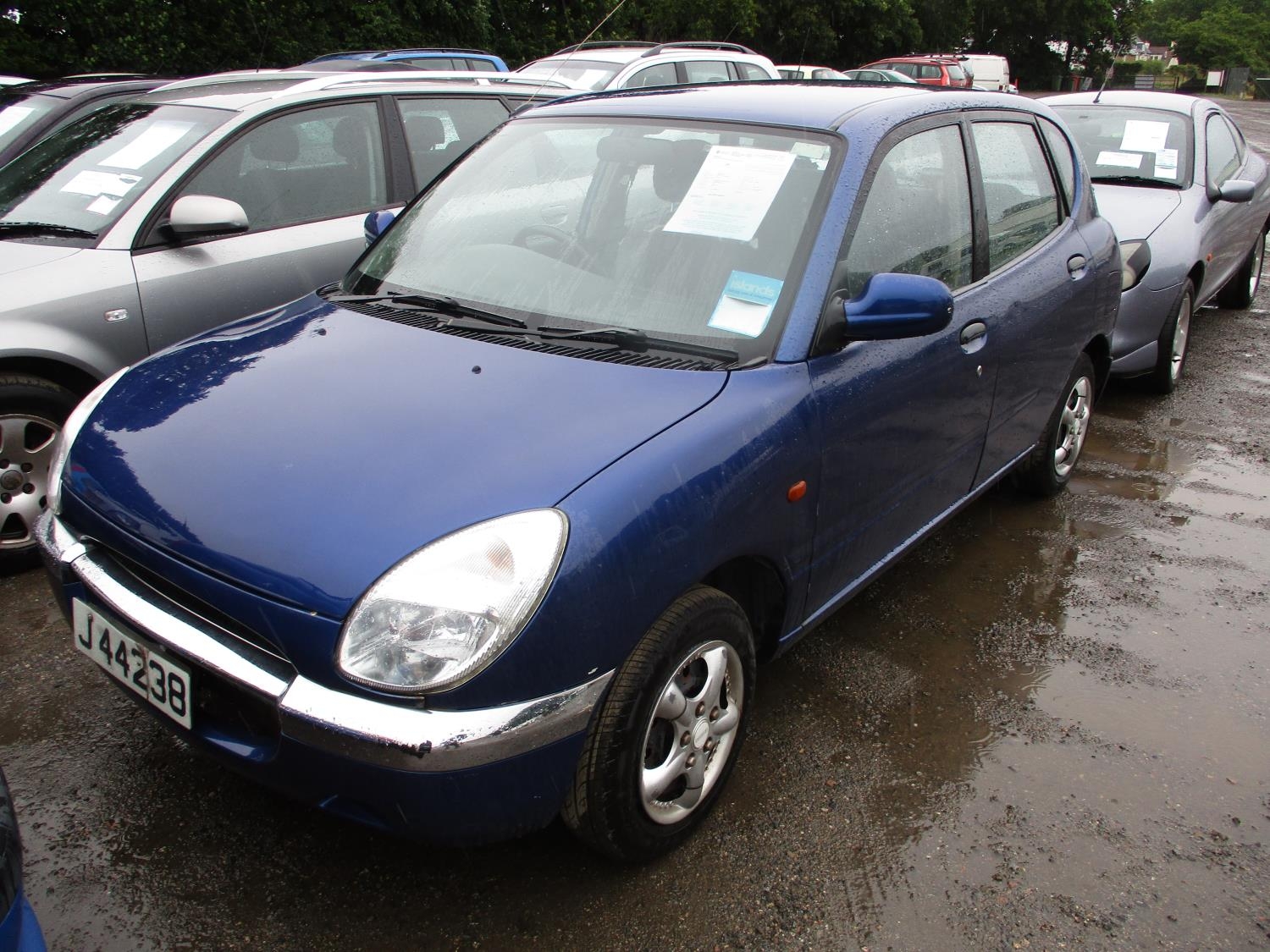 A 2000 Daihatsu Sirion 1.0 five door hatchback (automatic) J44238, odometer reading 65,399 miles