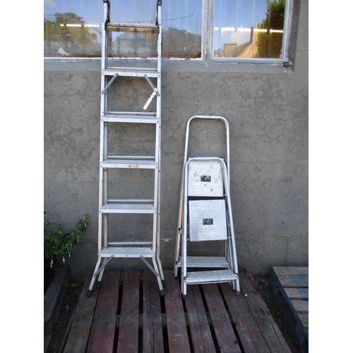 A Beldray three way top flight ladder together with two aluminium step