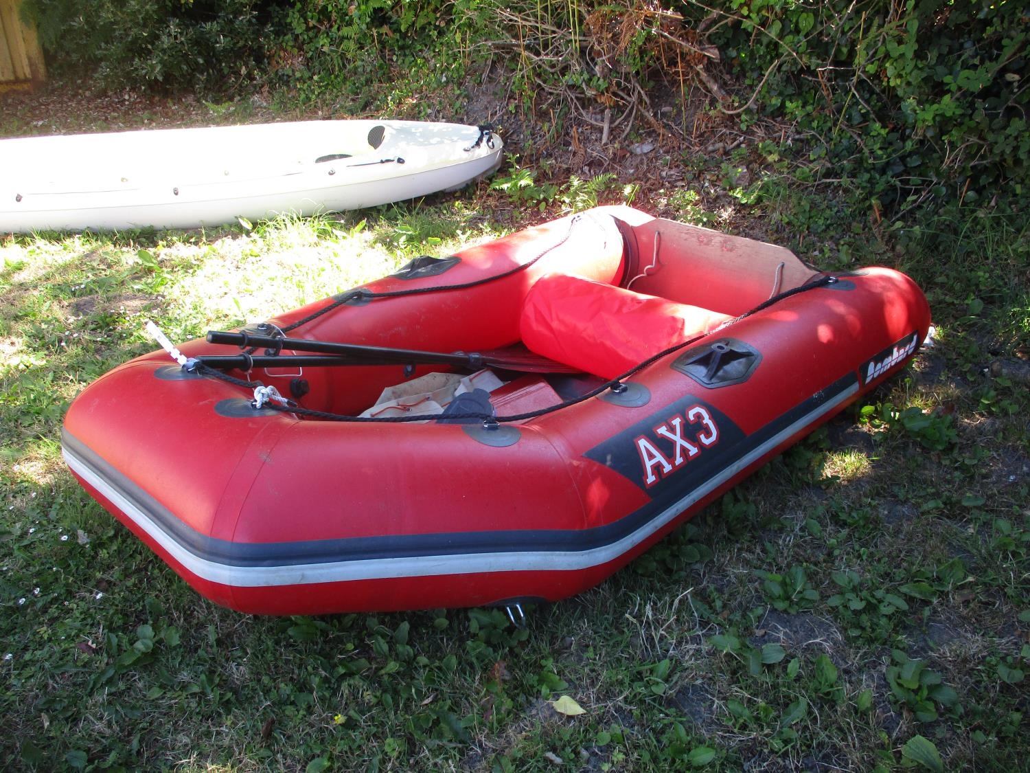 A Bombard AX3 inflatable dinghy complete with paddles, pump and other