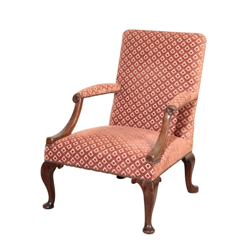 741 - A GEORGE II WALNUT LIBRARY ARMCHAIR covered in coral flowered-lozenge cut-velvet, 98cm high x 57cm w... 