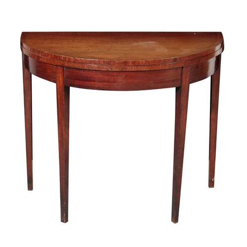752 - A GEORGE III MAHOGANY CARD-TABLE With D-shaped top, 74cm high x 89cm wide x 45cm deep

The estate of... 