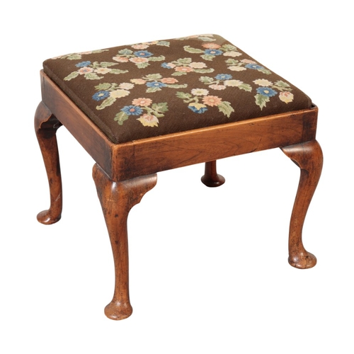757 - A GEORGE II STYLE ELM STOOL with a needlework drop-in seat, 41cm high x 45cm wide

The estate of the... 