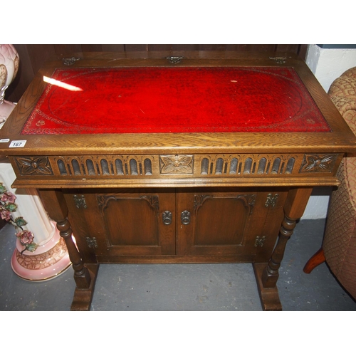 An Old Charm Oak Sloping Writing Desk With Lift Top And Cupboard