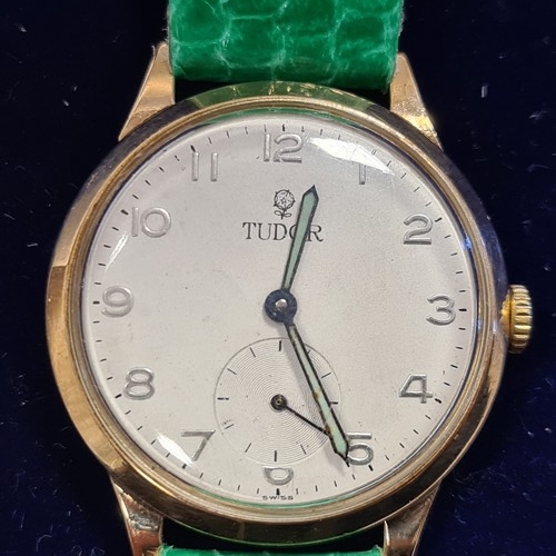 49 - 9ct case Gold Tudor Rolex. In good working order. With a later green reptile strap. Very good lot.