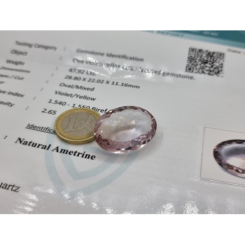 52 - An extremely bright natural ametrine oval stone of 47.92 carats.  Comes with certificate.