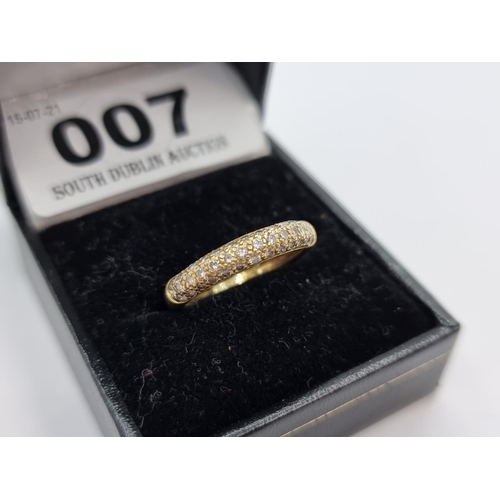 7 - A fine 18 carat gold diamond half eternity ring. Diamonds well matched and bright sparkle. Ring size... 