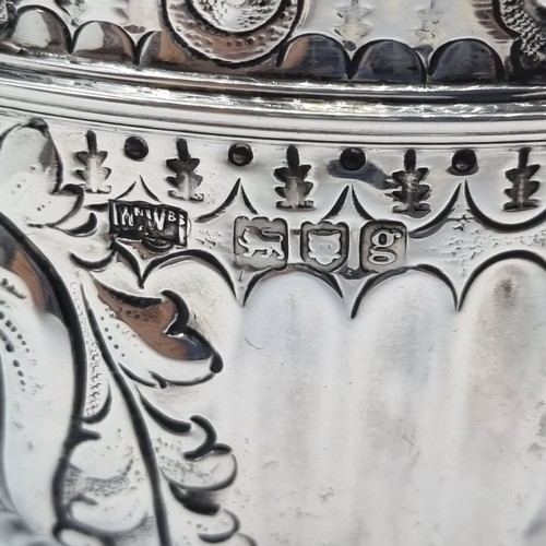 3 - A very fine large sterling silver, footed bowl. Profusely decorated, with insignia F to front. Maker... 
