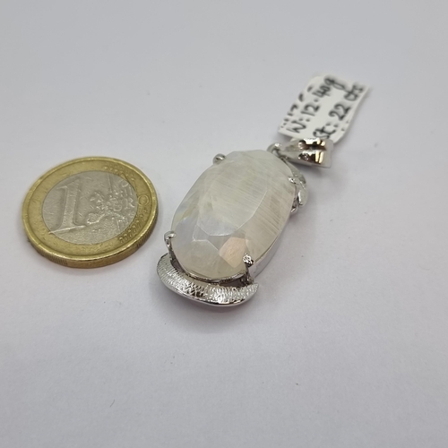 25 - A new very attractive, Sterling Silver  rainbow moonstone pendant. Stone is 22 carats, measuring 3 x... 