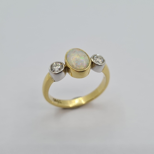 3 - Star Lot. L A very attractive opal and diamond set 10K (stamped 10 carat) gold ring. Opal with good ... 