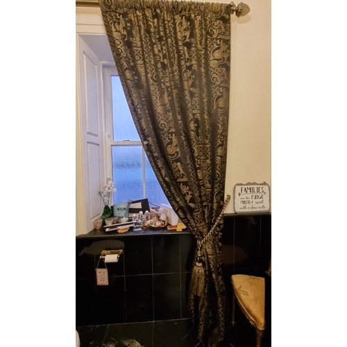 55 - A large brushed chrome curtain rail with acorn ends. With a lovely full length lined curtain upholst... 