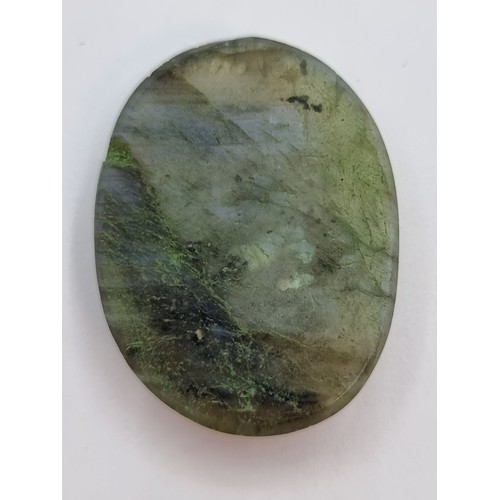 376 - Really unusual Large natural Laborite, stone 64.5 cts. Beautiful colour spectrum. With COA