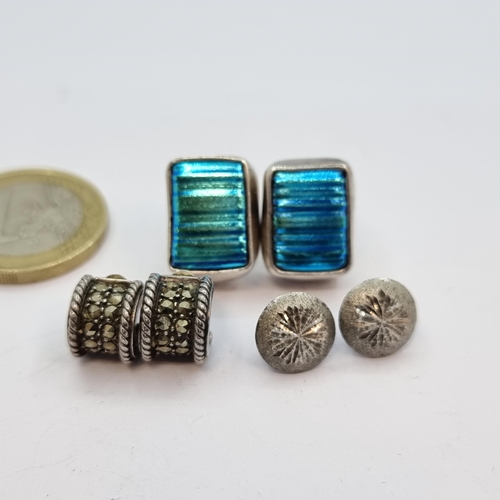 22 - Three pairs of sterling silver stud earrings. Two set with marcasite, together with a pair of green ... 