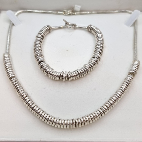 38 - Two very nice examples of a matching sterling silver bracelet and necklace with T bar fittings. Leng... 