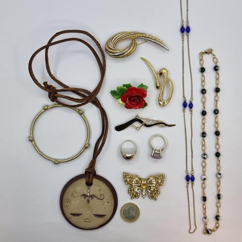 48 - A collection of costume jewellery items, consisting of two bead necklaces (measuring 40cm and 72cm),... 