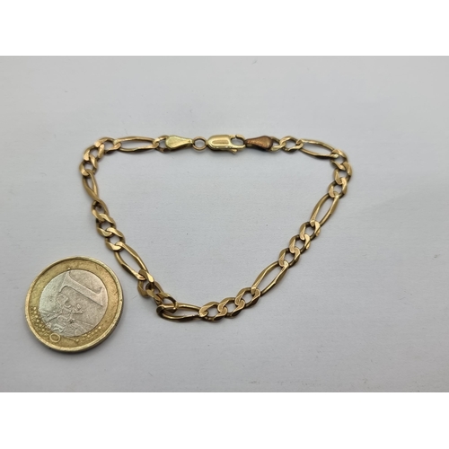 406 - A 9K gold space link bracelet. Length 18cm, weight 5.25g.