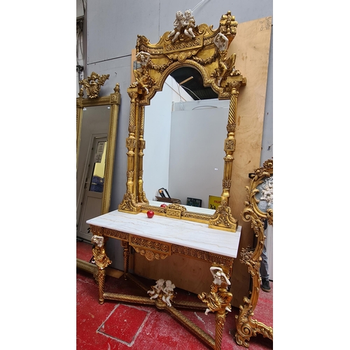352 - Star Lot : A striking white marble topped mirror console table  in a French Louis XV style complete ... 