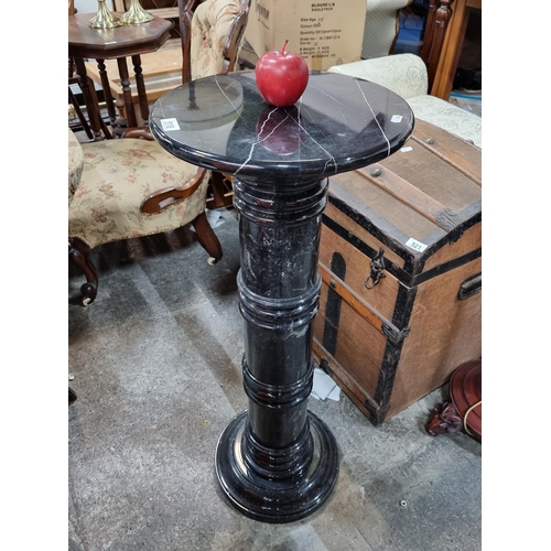 518 - Star lot : A genuine heavy black marble pedestal stand with attractive white veining. Bevelling thro... 