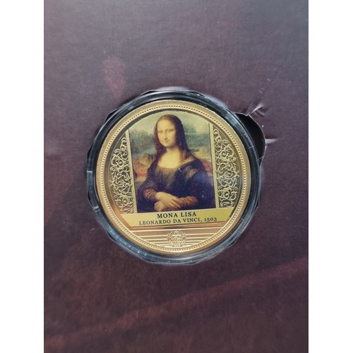 514 - A collection of coins depicting the World's Most Famous Paintings. Issued with certificate of owners... 