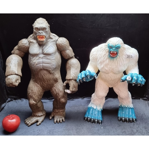 Two action figures including the Abominable Snowman and King Kong.