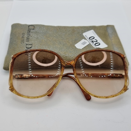 20 - An attractive pair of vintage original Christian Dior sunglasses with gold tone mounted stems. Comes... 