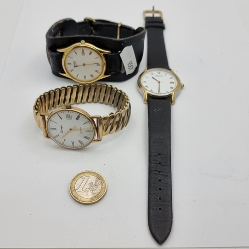 22 - Three watches, consisting of two Seiko examples (both with leather straps) and a Sovereign Quartz ex... 