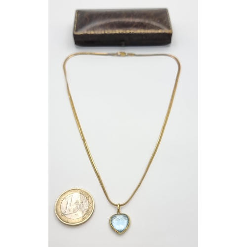 35 - A beautiful 9ct gold necklace, with a pretty heart shaped cut Aquamarine stone pendant. Length of ne... 