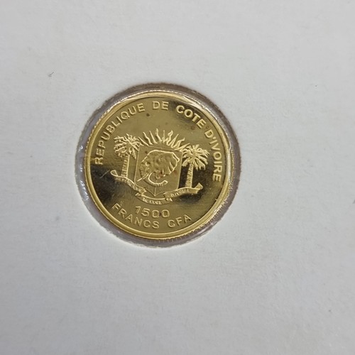 1 - A 1500 Franc CFA Choupin- Ivory Coast 2007 uncirculated gold coin. Weight 1 gram.999. This coin is m... 