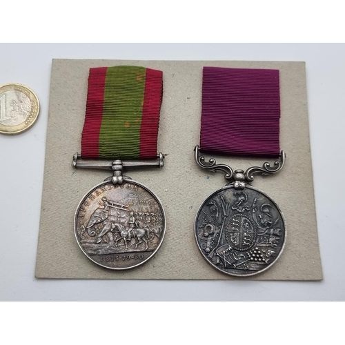 23 - Star Lot : Two rare Victorian Silver service medals, the first is a Afghanistan medal dated 1878-79-... 