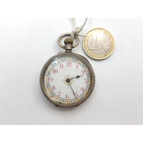 15 - A sterling silver white enameled face pocket watch, with pretty gold toned detailing. To reverse, th... 