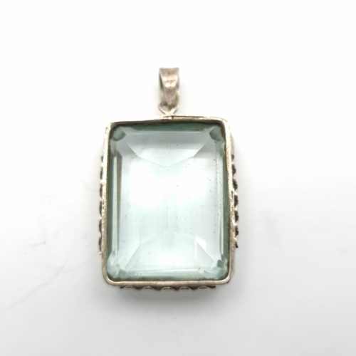 39 - A Facet cut Native American sterling silver pendant, with a fabulous large aquamarine Approx 5.5cts ... 