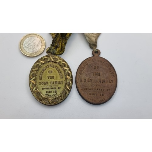53 - Two antique religious medals. Both stating 