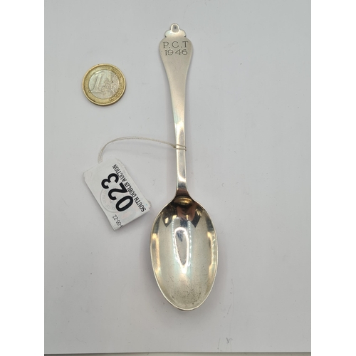 23 - A large sterling silver teaspoon. Hallmarked London 1905, maker Wakely & Wheeler. With P.C.T. 1946 t... 