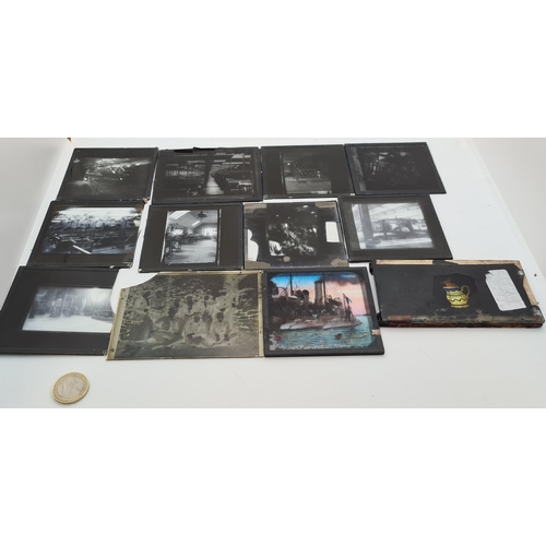 31 - An interesting collection of 12 antique magic lantern slides. Some depicting a large factory at the ... 