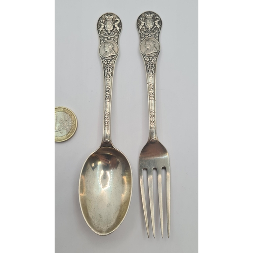 4 - An antique spoon and fork pair, with intricate detailing which includes the bust of queen Victoria a... 