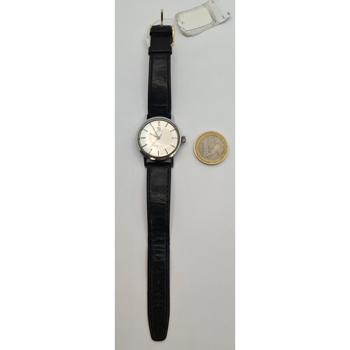 51 - A Tissot 3.7 wrist watch, with batton dial, sweep second hand and a nice leather strap. Watch with w... 