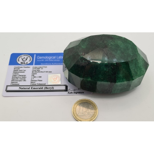 60 - Star Lot: A hugely impressive natural emerald of step cut design with an amazing 1519 karats. Measur... 