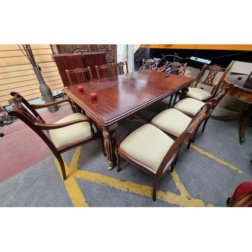 320 - Star Lot : A fantastic Victorian extendable dining table with ten chairs with lattice carved back an... 