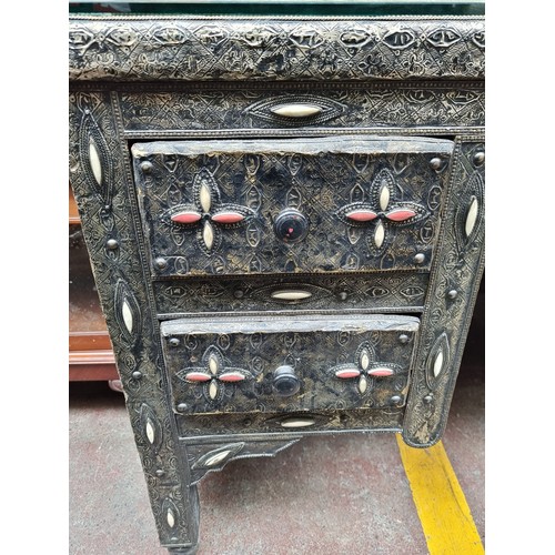 493 - Star Lot : A fantastically elaborate Moorish style desk with inlaid wood detail, glass top and four ... 