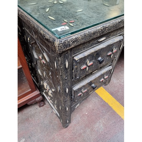 493 - Star Lot : A fantastically elaborate Moorish style desk with inlaid wood detail, glass top and four ... 