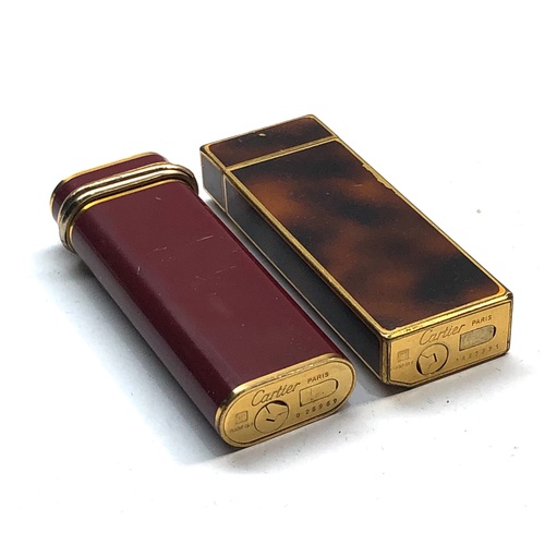 2 Cartier cigarette lighters