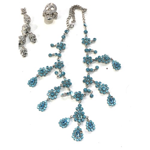 404 - Selection of Butler & wilson jewellery 2 blue stones missing in necklace