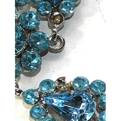 404 - Selection of Butler & wilson jewellery 2 blue stones missing in necklace