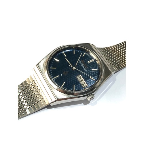 Vintage Seiko king quartz 5856-7040 watch is in working order but no warranty given