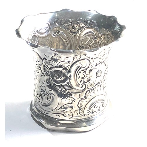 18 - Antique silver floral embossed vase Sheffield silver hallmarks measures approx 9cm dia height 9cm we... 