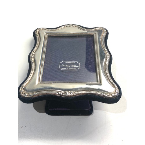 14 - 3 silver hallmarked picture frames largest measures approx 20cm by 15cm