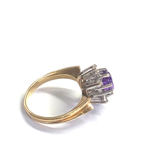 56 - 18ct gold diamond & amethyst dress ring weight 3.6g