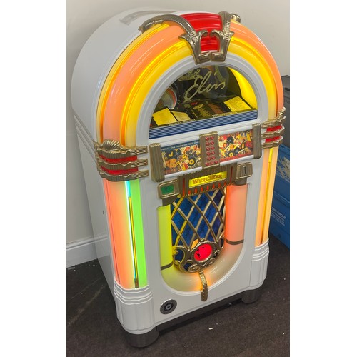 103a - This is a Wurlitzer Elvis One More Time CD jukebox, holds 50 CDs. Eight bubble tubes and changing Li... 