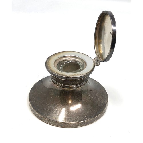35 - Antique silver desk inkwell with glass liner birmingham silver hallmarks measures approx 11cm dia