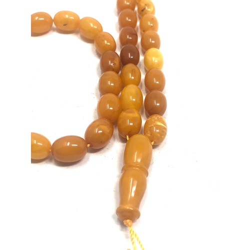 59 - Egg yolk amber bead necklace weight 37g